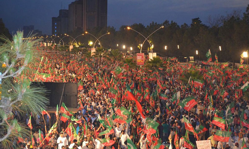 Photo shows thousands of workers and supporters gathered at D-Chowk in Islamabad for PTI's protest rally against rigging in the May 2013 general elections.—Photo by Irfan Haider