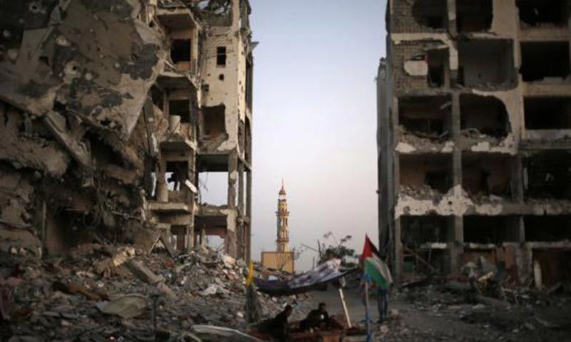 A Palestinian man reacts in front of the remains of a mosque, which witnesses said was destroyed in an Israeli air strike. — Reuters/File