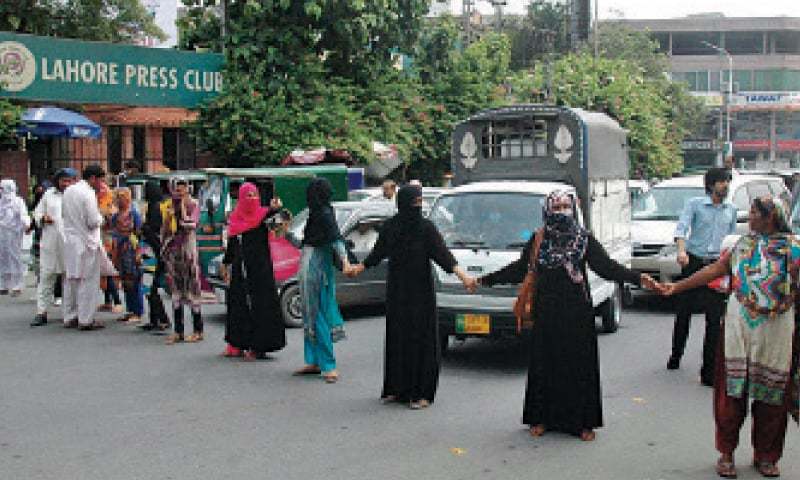 Candidates for lady constable slots protest outside the Lahore Press Club. — Online