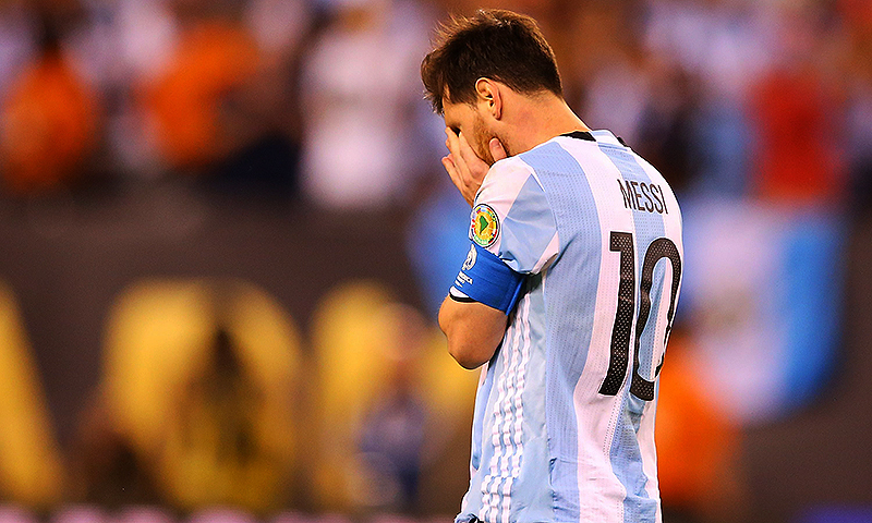 Lionel Messi of Argentina reacts after missing a penalty kick against Chile during the Copa America final at MetLife Stadium on June 26, 2016. &mdash; AFP