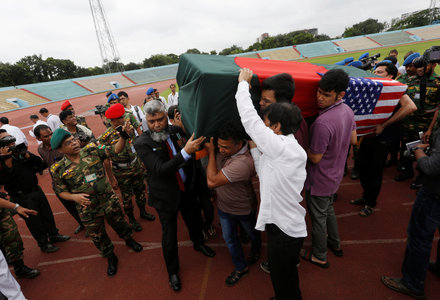 Relatives carry the coffin of a victim who was killed in the Dhaka attack. —Reuters