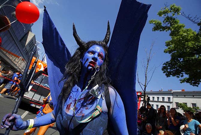 A reveller participates in the Karneval der Kulturen (Carnival of Cultures), a street parade of Berlin's ethnic minorities, in Berlin.—Photo by Reuters