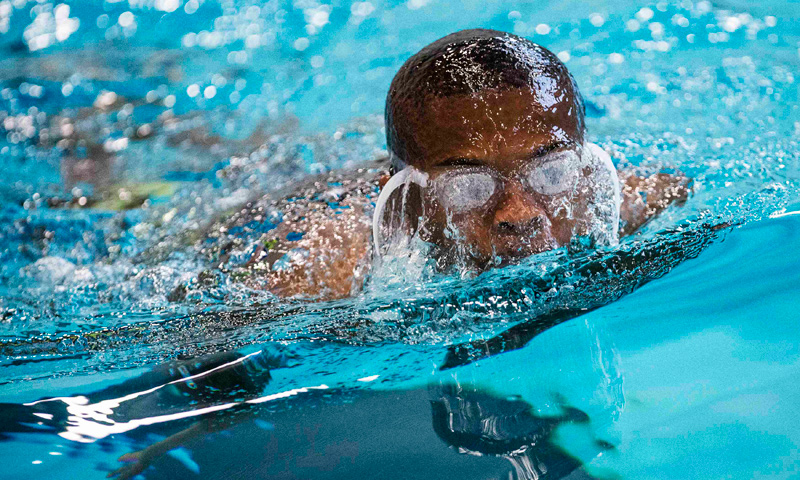 Wayne Eberson swims at Camp Abilities in Brockport, New York.