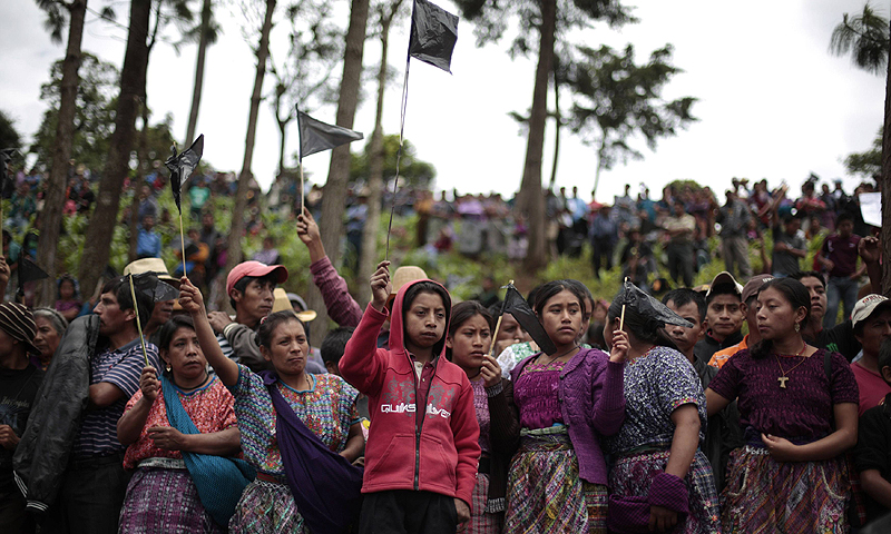Local residents of San Juan Sacatepequez hold black flags as a symbolic act of mourning, during a protest against the inauguration of the construction of Cementos Progreso Company, a cement factory in San Juan Sacatepequez, 30 km (18 miles), from Guatemala City. Thousands of local residents protested against the construction of the factory on Friday, saying the factory will cause economic and ecological damage to the community, according to local media.—Photo by Reuters