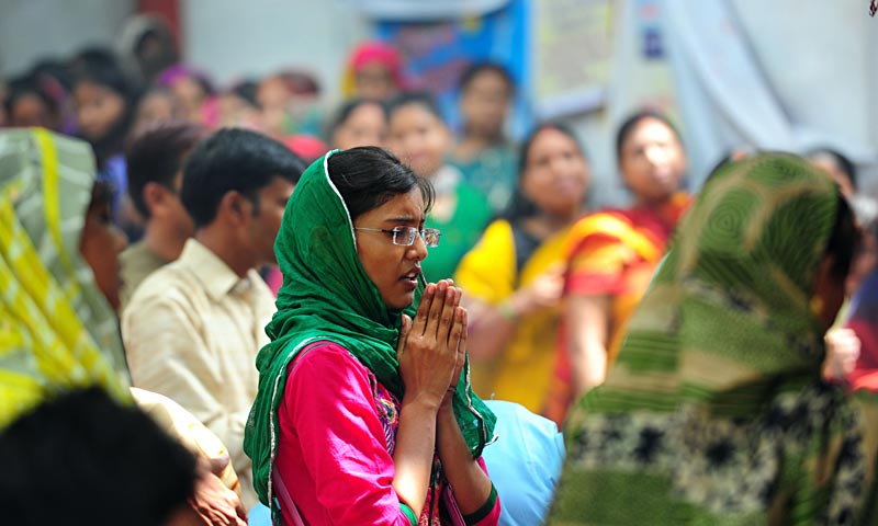 Indian Hindu devotees offer prayers to Lord Shiva at a temple, during the Holy month of Shravana in Allahabad. Shravan is considered the holiest month of the year and on each Monday of the month, known as Shravan Somvar, worshippers offer prayers for a happy and prosperous life. — AFP Photo
