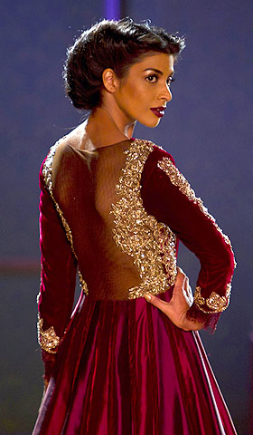 A model displays a creation by designer Manish Malhotra during the Delhi Couture Week in New Delhi.—Photo by AP