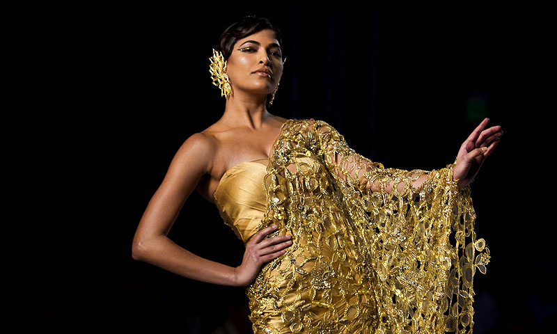 A model displays a creation by designer Gaurav Gupta during the Delhi Couture Week in New Delhi.—Photo by AP