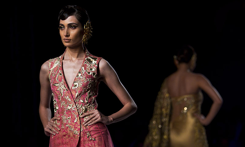Models display a creation by designer Gaurav Gupta during the Delhi Couture Week in New Delhi, India.—Photo by AP