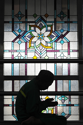 An Indonesian Muslim man prays at a mosque in the holy month of Ramadan in Jakarta. — AFP Photo