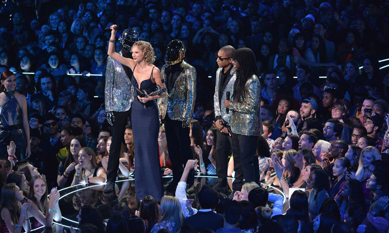Taylor Swift, Daft Punk, Pharrell Williams and Nile Rodgers speak onstage. –Photo by AFP