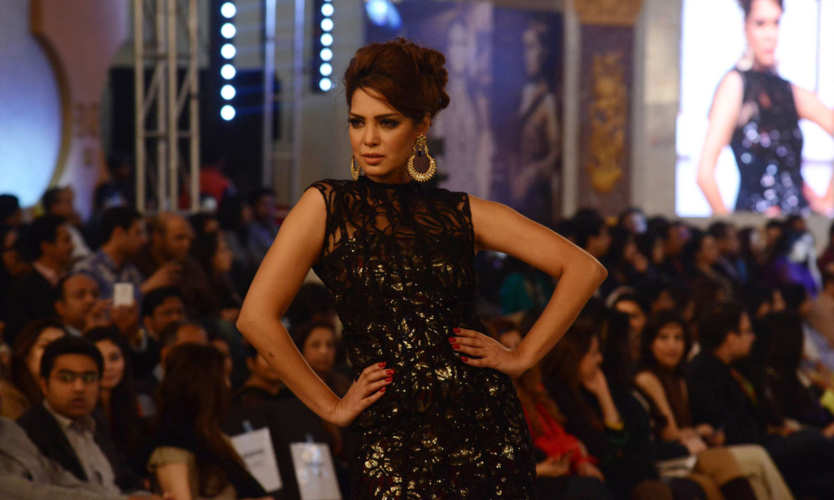 A Pakistani model presents a creation by designer Ammar Shahid. – Photo by AFP