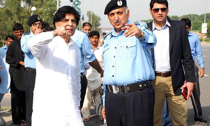 Federal Interior Minister Chaudhry Nisar Ali Khan reviewing the security arrangements for the participants of PTI Azadi March and Inqilab March.— Photo by Online