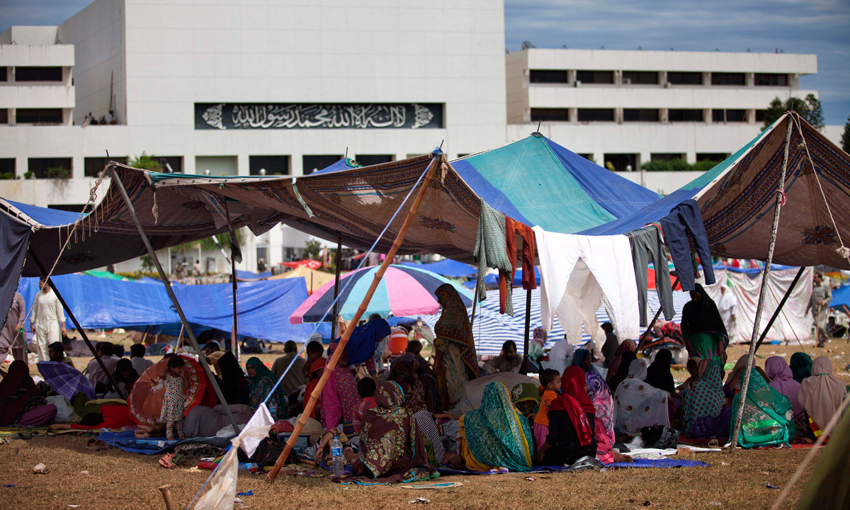 Supporters of Tahirul Qadri camp in the vicinity of the parliament building in Islamabad. - Photo by AP