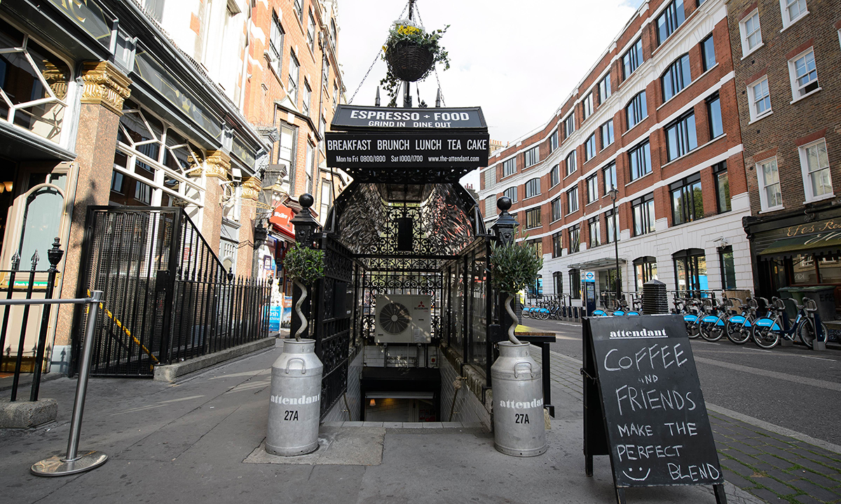 A picture shows the exterior of "Attendant", a former public toilet that has been converted into a coffee shop and sandwich bar in central London. — Photo by AFP