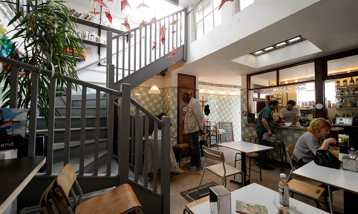 A picture shows the interior of the "The Convenience", a former public toilet that has been converted into a coffee shop and restaurant in Hackney, east London. — Photo by AFP