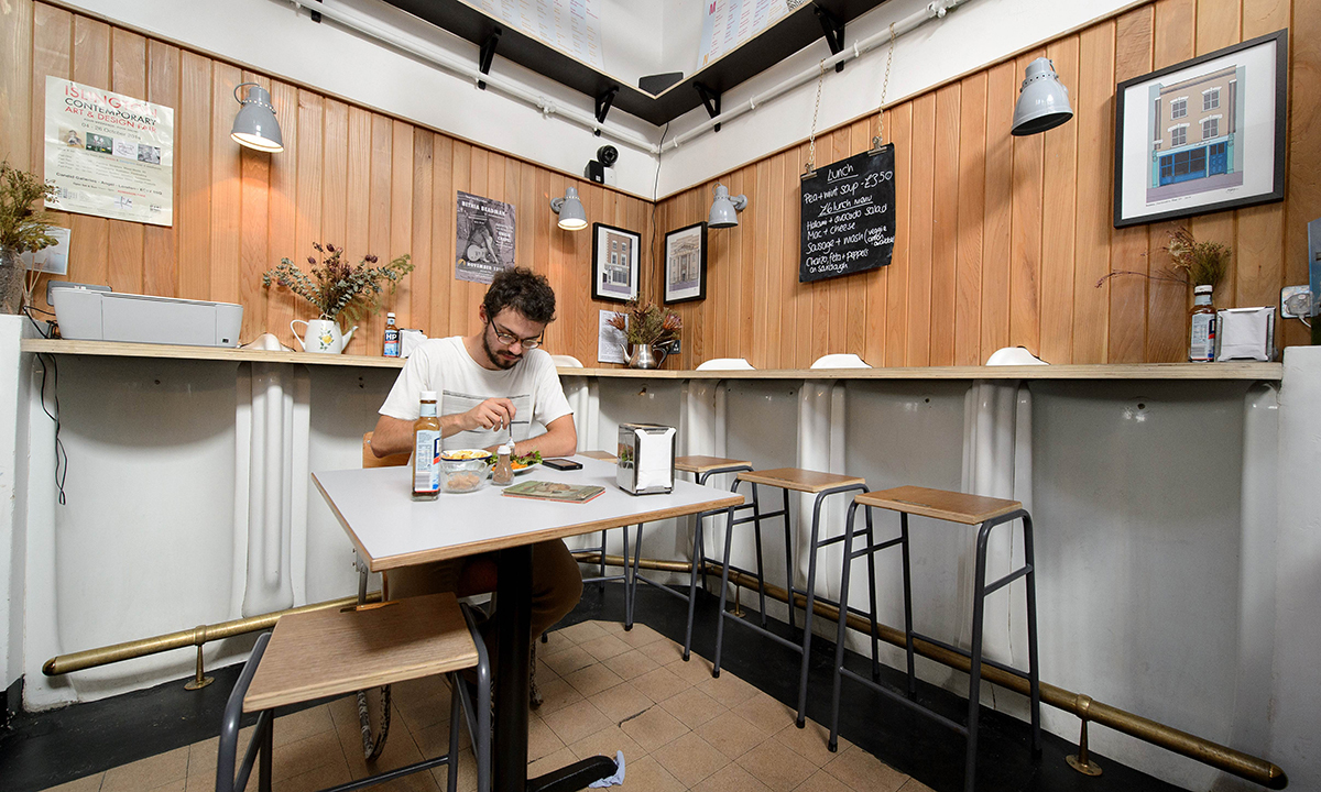 A picture shows the interior of the "The Convenience", a former public toilet that has been converted into a coffee shop and restaurant in Hackney, east London. — Photo by AFP
