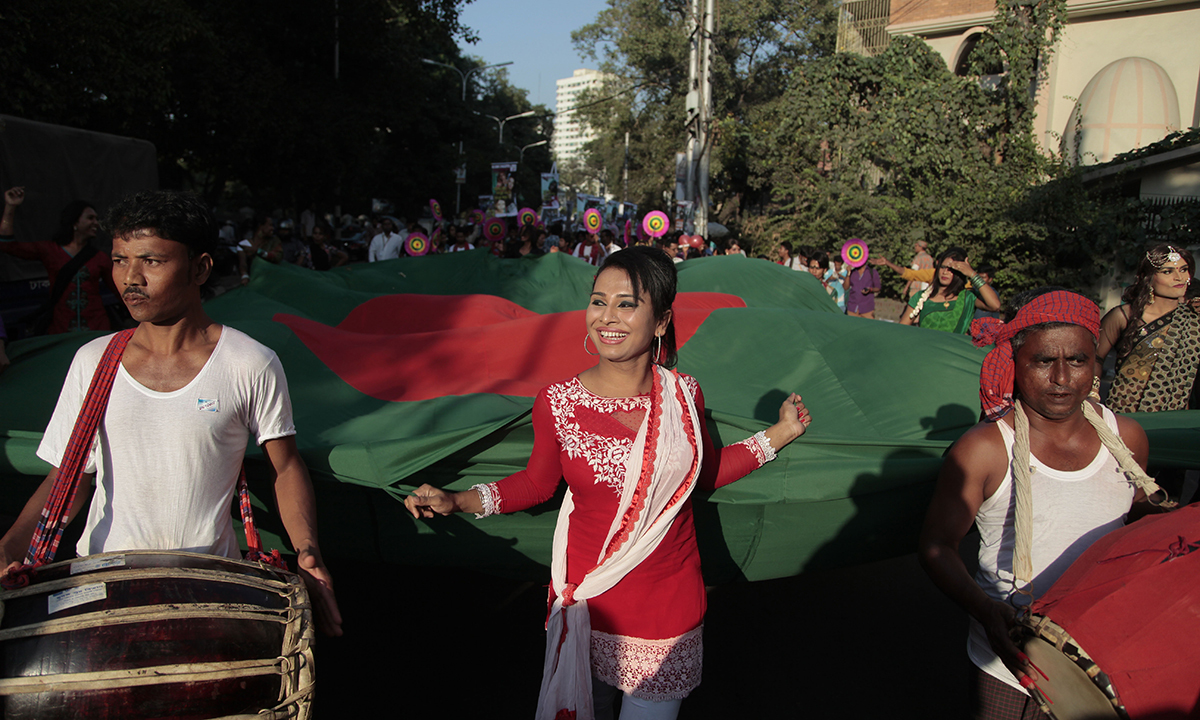 Members of transgender community hold their national flag.— AP Photo