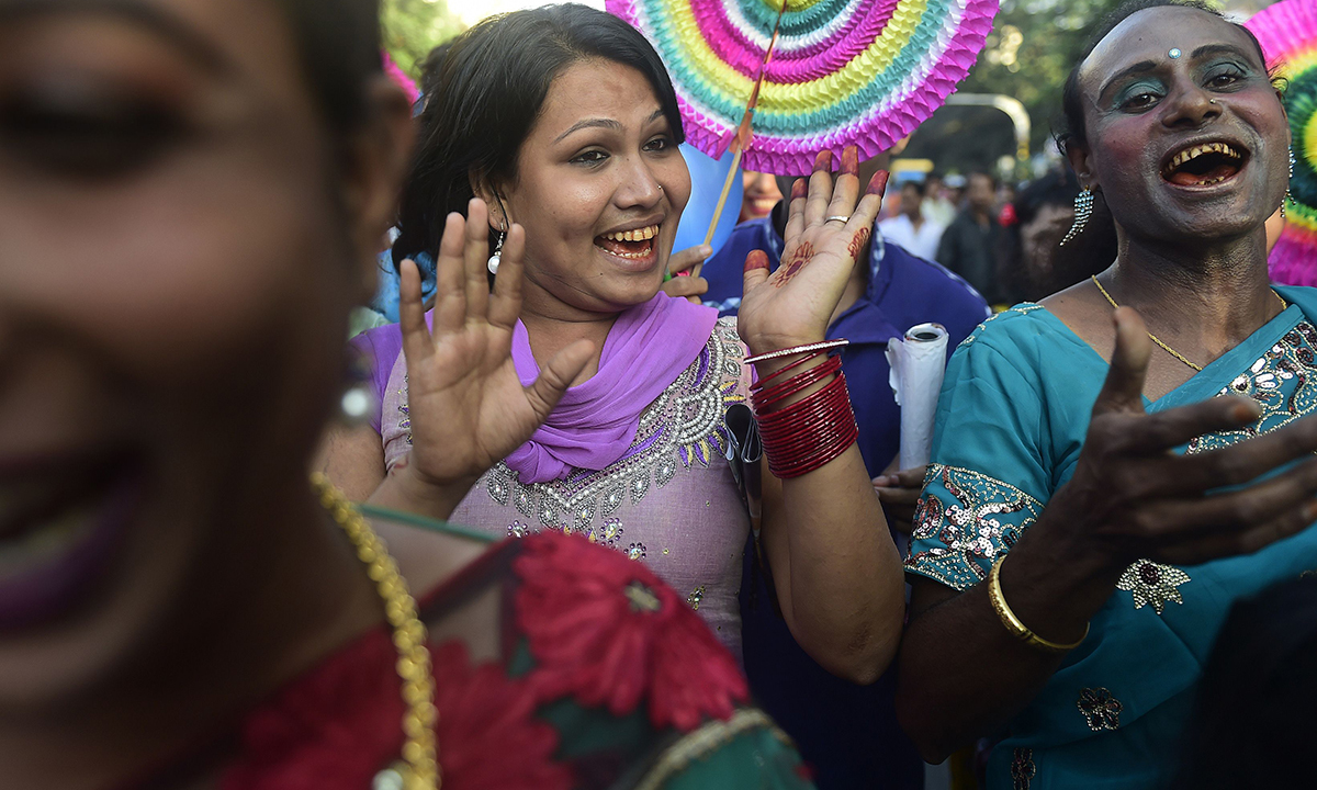 Bangladeshi transgenders dance at the rally.— AFP Photo