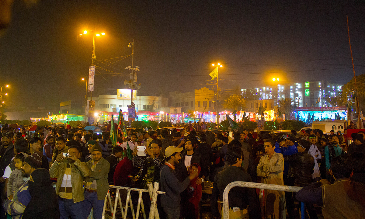 A crowd gathers at Numaish Chawrangi to participate in festivities on the occasion of 12th Rabi ul Awwal. — Muhammad Umar A crowd gathers at Numaish Chawrangi to participate in festivities on the occasion of 12th Rabi ul Awwal. — Muhammad Umar