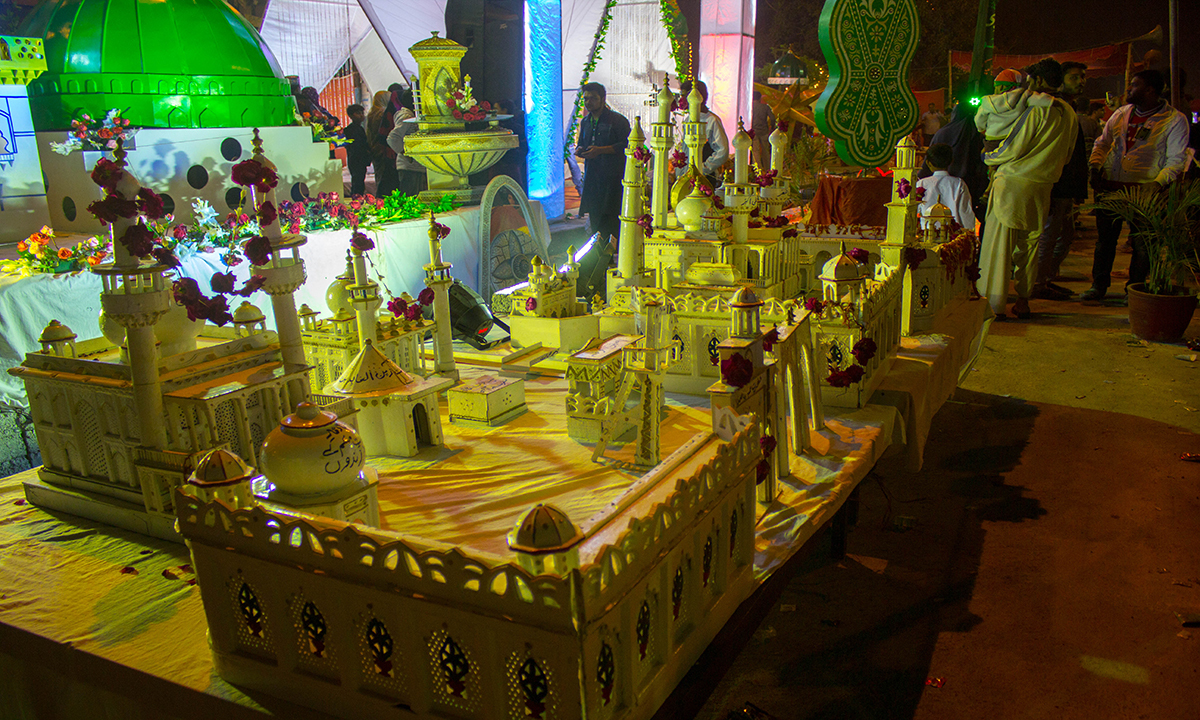 Models of Masjid-e-Nabvi and other holy places placed at a street in Karachi. — Muhammad Umar Models of Masjid-e-Nabvi and other holy places placed at a street in Karachi. — Muhammad Umar