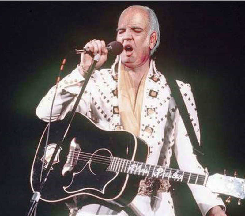 Still alive: Elvis performing at a secret concert for men and women who own off-shore companies in Panama.