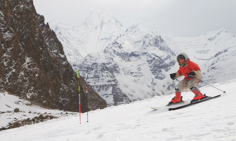 One of the youngest students speeding down a slope