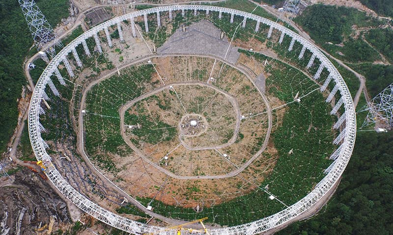 This file photo taken on July 29, 2015 shows the 500m Aperture Spherical Radio Telescope (FAST) under construction in Pingtang, southwestern China's Guizhou province. ─ AFP