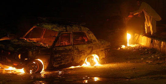 Karachi violence, car torched