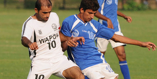 Wapda continue their domination of the Pakistan Premier Football League with a 12th consecutive win. —Photo by Arif Ali/White Star 