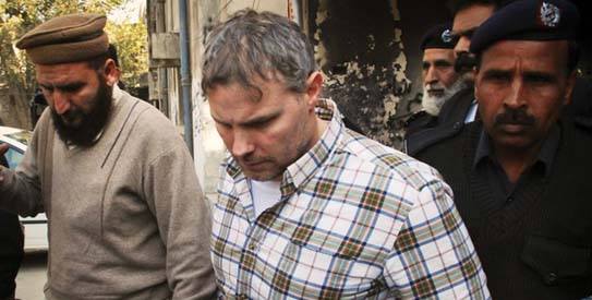 File photo of U.S. consulate employee Raymond Davis being escorted in Lahore