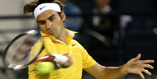 Roger Federer returns to Richard Gasquet. —Photo by AFP