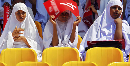 School children watch the Pakistan-Kenya match at Hambantota. With the host nation not playing today, attendance has been low at the match. —Photo by Reuters School children watch the Pakistan-Kenya match at Hambantota. With the host nation not playing today, attendance has been low at the match. —Photo by Reuters