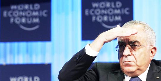 Palestinian Prime Minister Salam Fayyad attends a session at the World Economic Forum in Davos