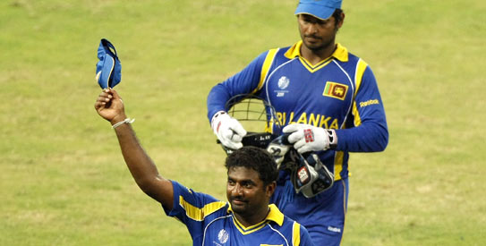 Muttiah Muralitharan, playing his penultimate international cricket match, took a wicket with his last ball on Sri Lankan soil. —Photo by AP