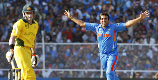 Zaheer Khan bowled out Michael Hussey in his second spell. —Photo by AFP