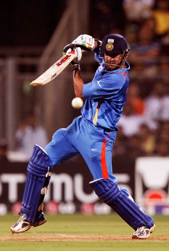 Gautam Gambhir hits a shot. ? Photo by AP