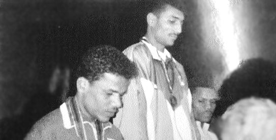 Javed Jan (centre) in better times – getting rewarded for his efforts in the ring. —File photo courtesy Shazia Hasan