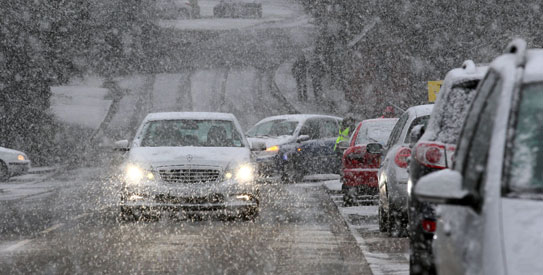 Watch your speed in snow – not too fast that you risk losing control, but not so slow that you risk losing momentum when you need it. —AFP Photo
