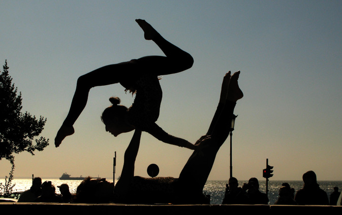 Dancers perform for an outdoor event on the seafront, in the northern Greek city of Thessaloniki. Carnival celebrations will peak Sunday with street parades planned in cities across Greece. ? AP Photo.