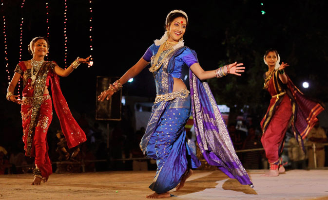 Indian dancers from Maharashtra state wearing traditional attire perform during the Basant Utsav or Spring Festival celebrations at Gandhinagar, about 35 kilometers (22 miles) from Ahmedabad, India. The ten-day long festival, began Thursday, features culture and crafts of various Indian states. ? AP Photo.