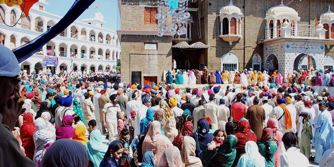 Devotees celebrate at the conclusion of the Besakhi festival at Gurdwara Panja Sahib in Hasan Abdal. – Photo by Online