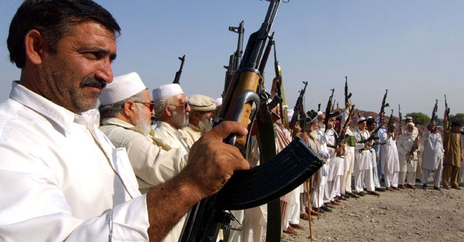 Members of the tribal force in Darra Adam Khel display their weapons in a show of strength against the Taliban. The tribal region of Darra Adam Khel is home to a huge cottage weapon industry.