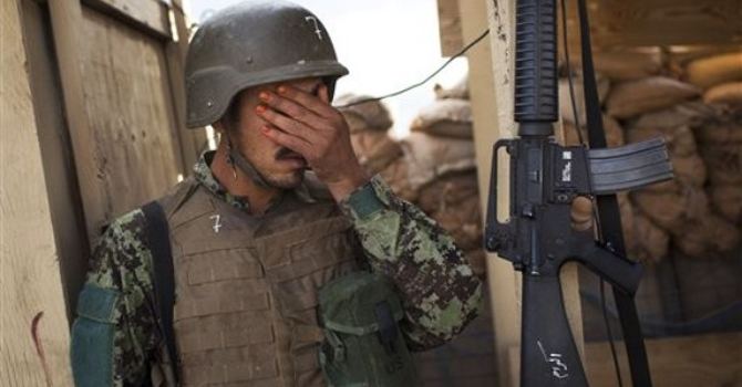 An-Afghan-National-Army-soldier-gestures-as-he-mans-a-checkpoint-in-Logar-province,-east-Afghanistan670 An Afghan National Army soldier gestures as he mans a checkpoint in Logar province, east Afghanistan.—AP Photo