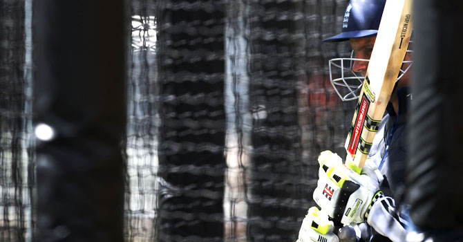 Andrew Strauss watches from the batting nets during a practice session at Lord's. England's Test captain has said he will not be stepping down from the position. – Photo by AFP