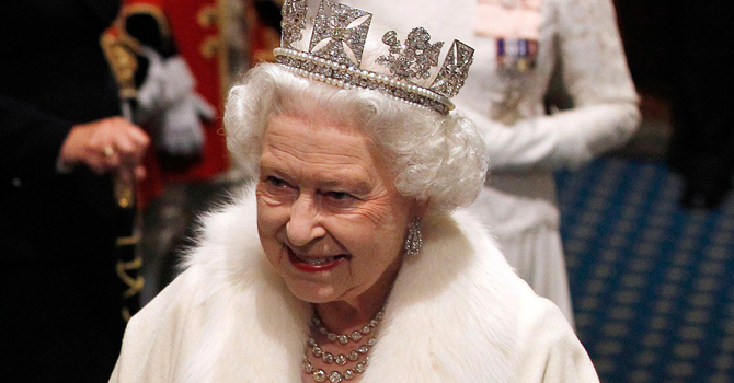 Britain's Queen Elizabeth II arrives at the Palace of Westminster for the State Opening of Parliament in London.—AFP Photo