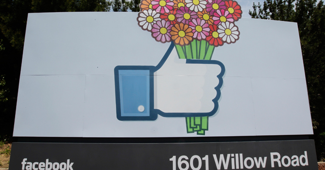 Flowers-were-added-to-a-Facebook-sign-in-front-of-Facebook-headquarters-in-Menlo-Park,-Cali670 Flowers were added to a Facebook sign in front of Facebook headquarters in Menlo Park, California.—AP Photo
