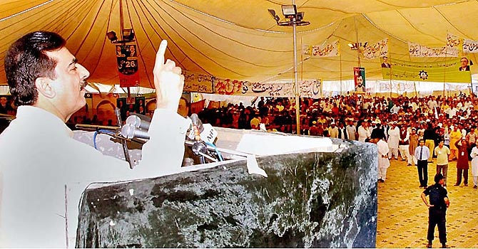 Prime Minister Syed Yusuf Raza Gilani addressing a public meeting. APP