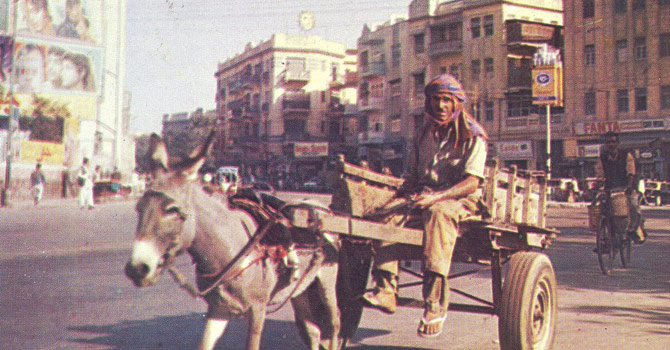 Karachi on the day the reactionary military junta led by Ziaul Haq toppled the Z A. Bhutto regime (July 5, 1977). In the background is a large cinema that closed down in the 1980s.