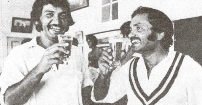 Former Pakistani test team opener, Sadiq Muhammad (left) and  former Pakistan cricket captain, Mushtaq Muhammad, share a beer in Sydney in January, 1977.