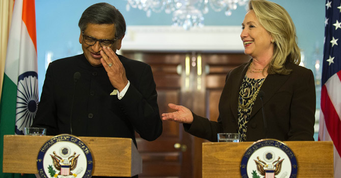 Clinton-Krishna-afp-670 Clinton-Krishna-afp-670